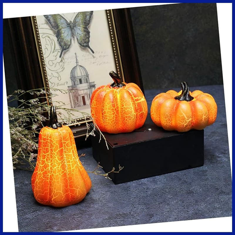 3 led pumpkins lantern on a desk